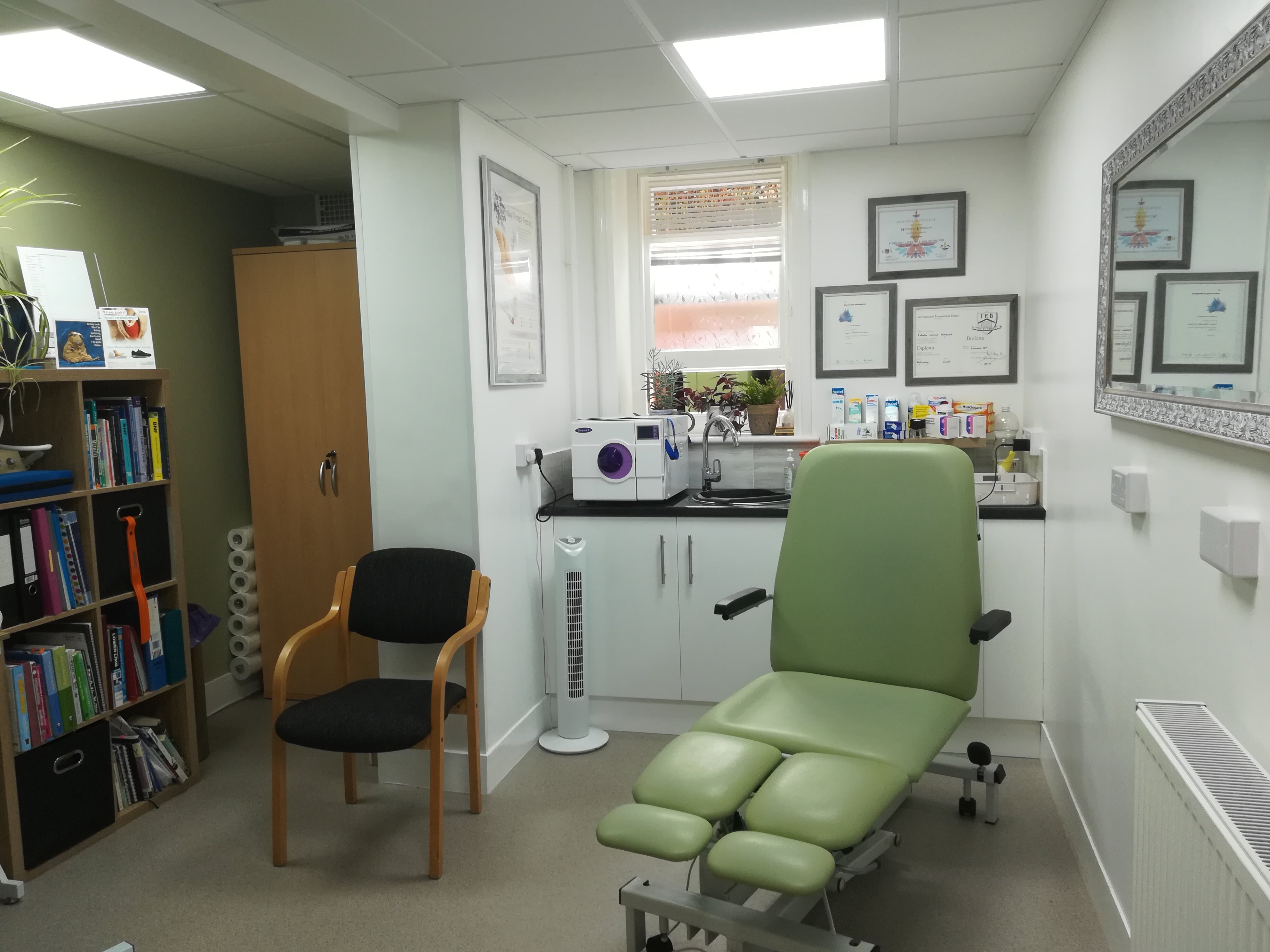 inside view of Earlsgate Podiatry clinic, showing a treatment chair in a brightly lit room