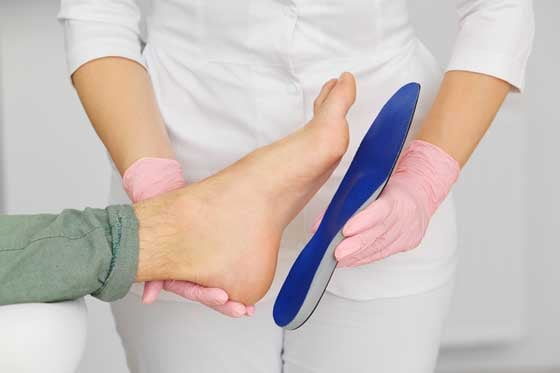 Foot and heel being assessed